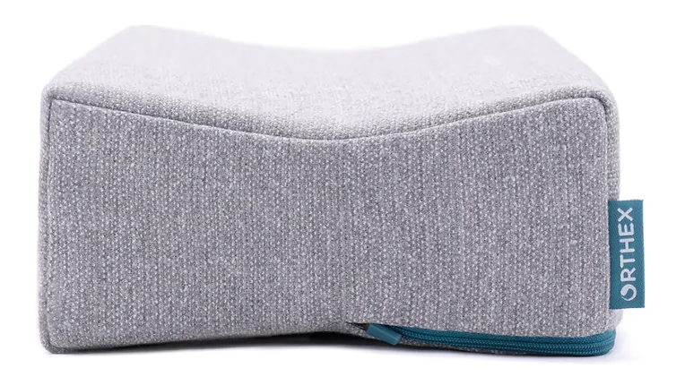 Oreiller détente genoux-chevilles