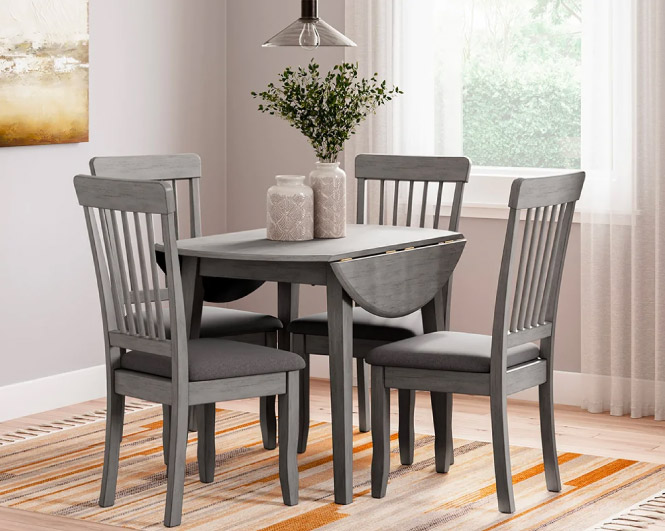 Table ronde dont les bouts pendent vers le bas